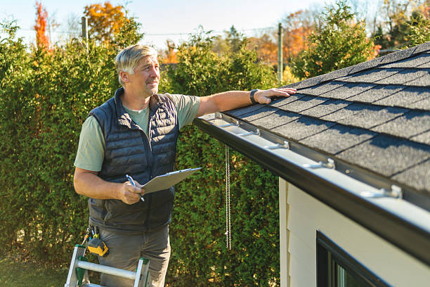 Professional Roof Replacement technician working in Genoa, CO